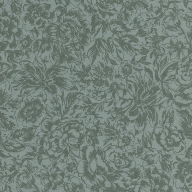 Greenish blue fabric with a tonal designs of large florals and leaves.