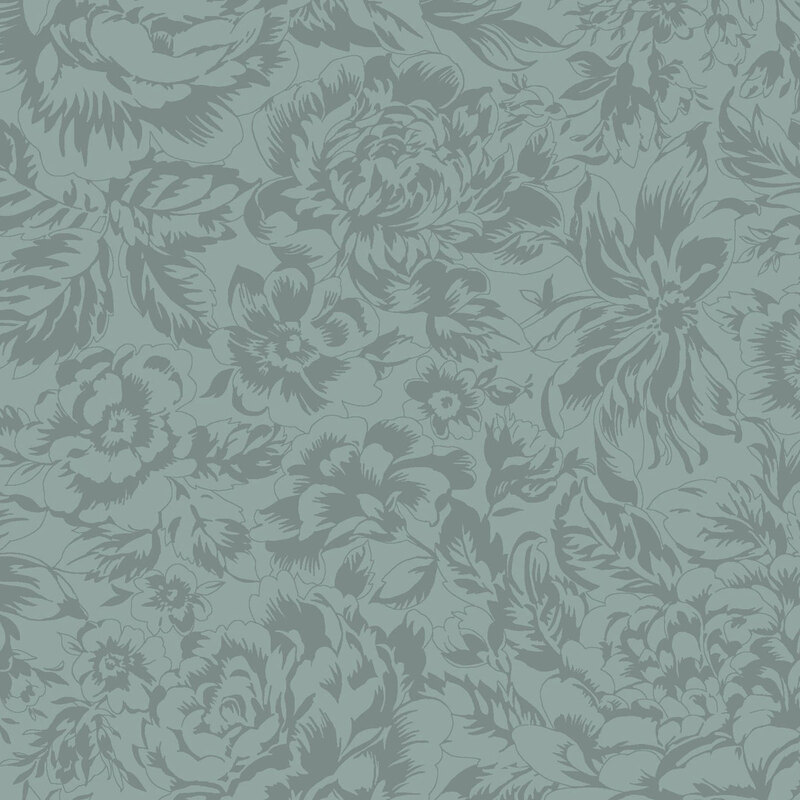 Greenish blue fabric with a tonal designs of large florals and leaves.