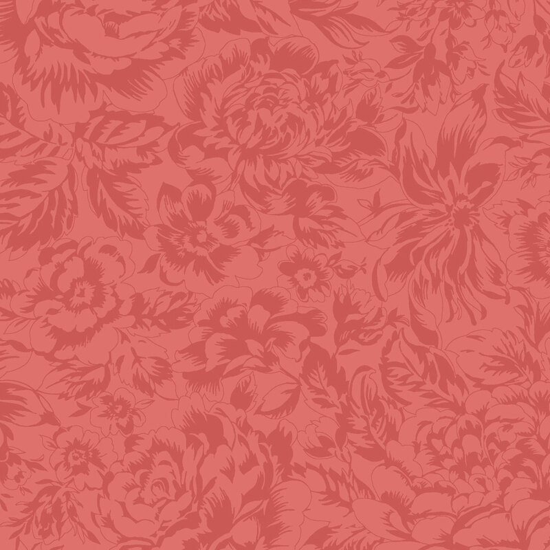 Red fabric with a tonal designs of large florals and leaves.