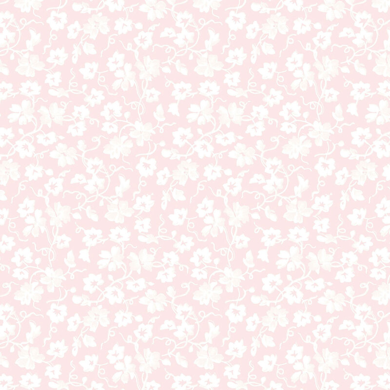 Pastel pink fabric with a white pattern of florals and swirling vines.