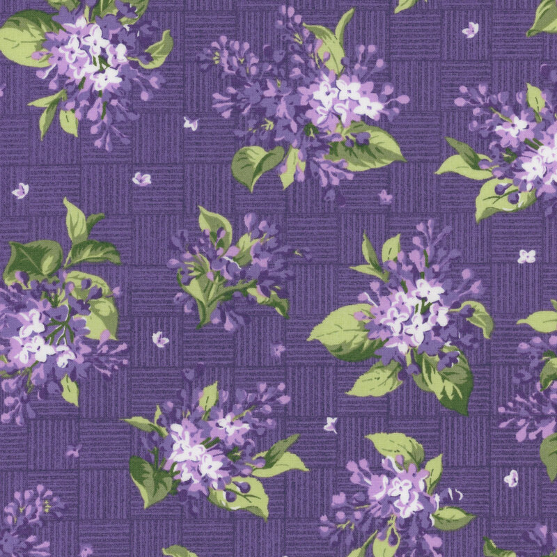 Bouquets of lilacs tossed on a dark purple crosshatched background.