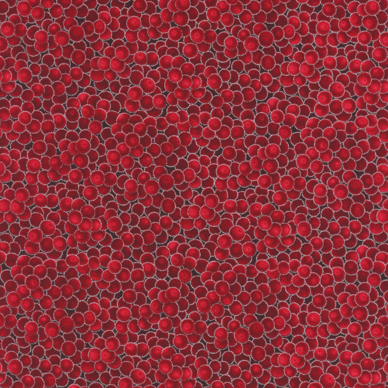 Red fabric with an overlapping berry design with silver metallic accents.