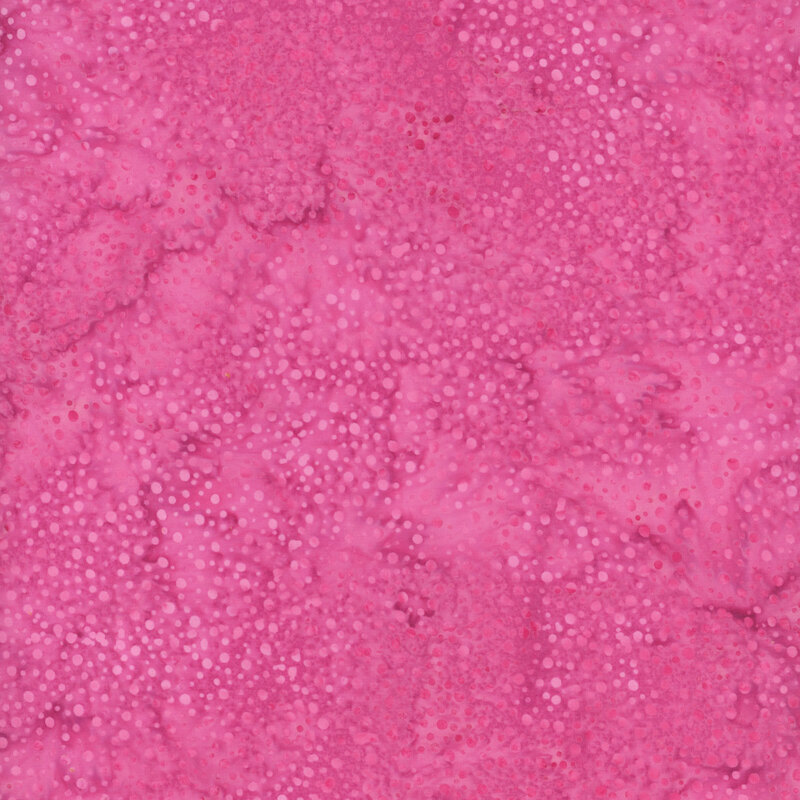 Pink fabric with mottled and tonal dots pattern 