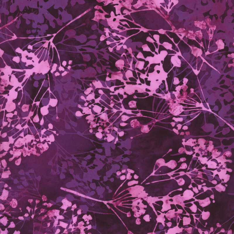 fabric pattern of purple floral blossoms 