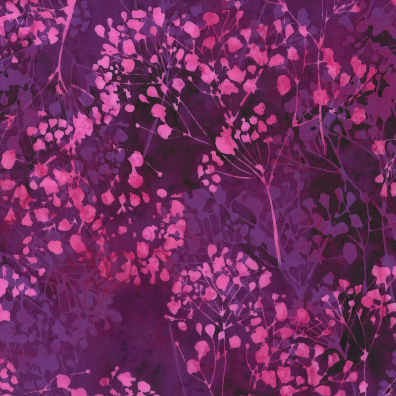 fabric pattern of purple floral blossoms 