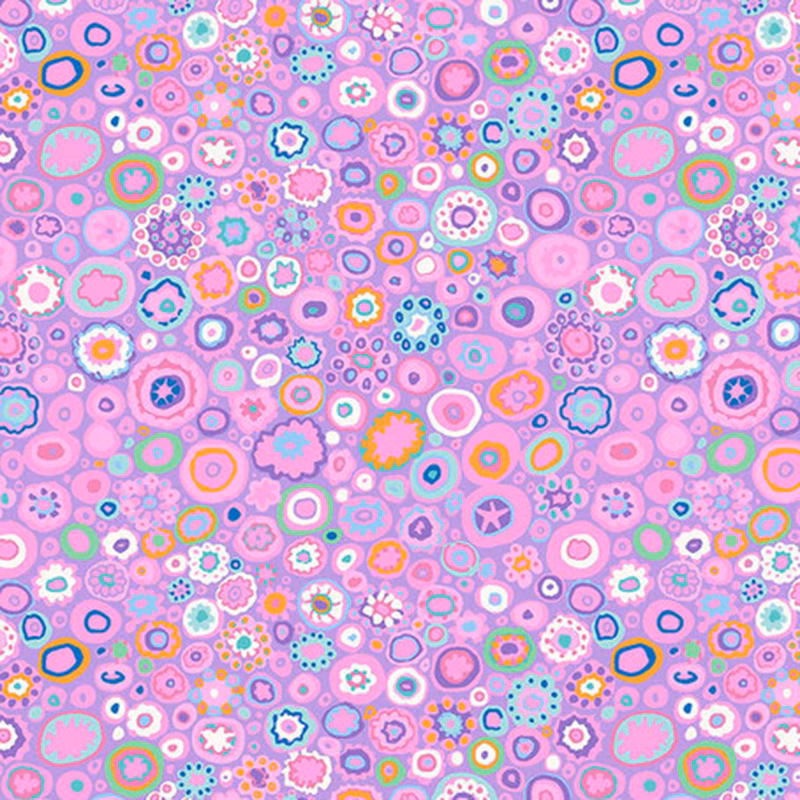 Colorful abstract pattern featuring circular shapes in various sizes on a pink background.