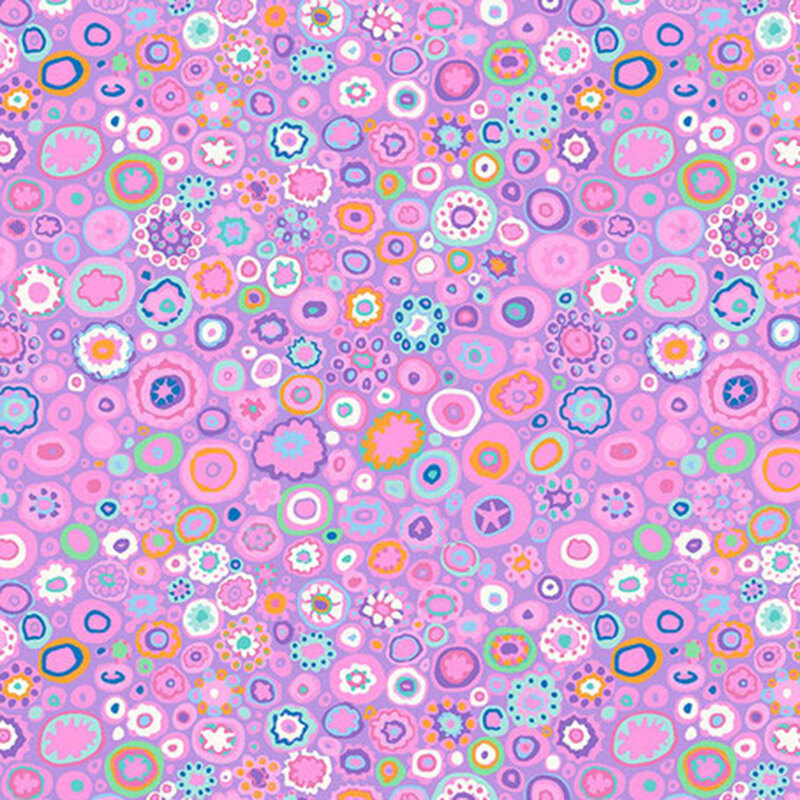 Colorful abstract pattern featuring circular shapes in various sizes on a pink background.