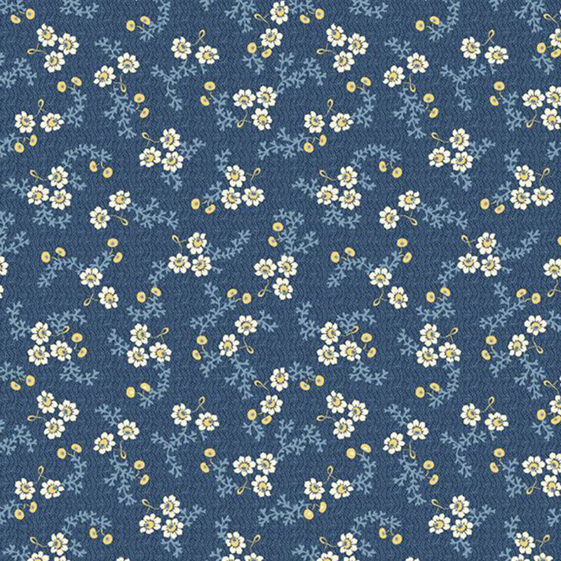 Fabric featuring small white flowers and blue leaves on a blue background.