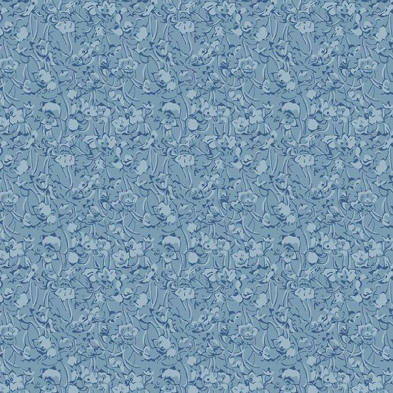 Tonal fabric featuring a floral pattern in shades of blue creating a textured look.