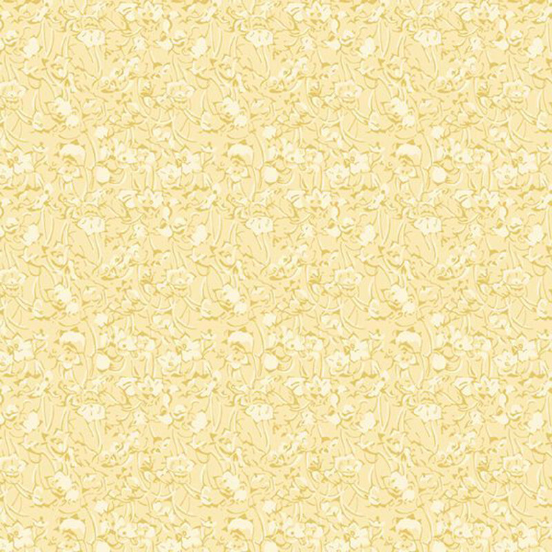 Tonal fabric featuring a floral pattern in shades of yellow creating a textured look.