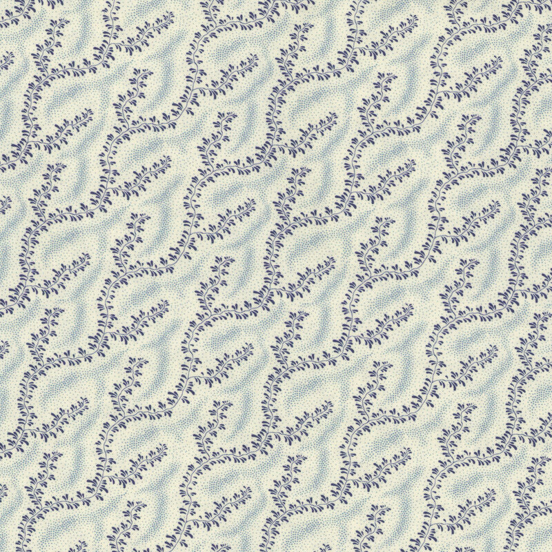 A repeating pattern of navy blue sprawling vines on a cream background