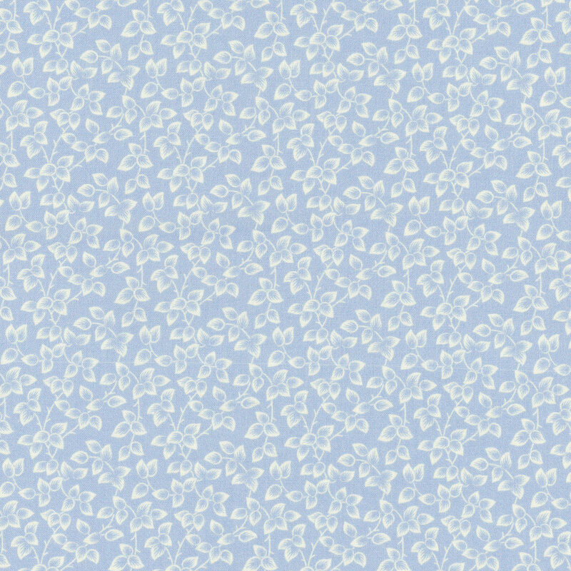 Light blue fabric packed with cream leaves