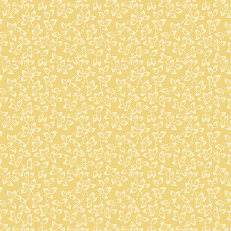 Yellow fabric packed with cream leaves