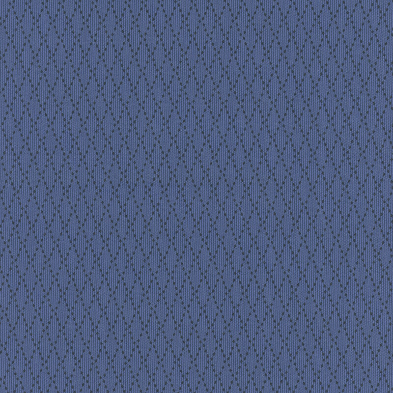 A textured blue fabric with a repeating diamond pattern of small dots.