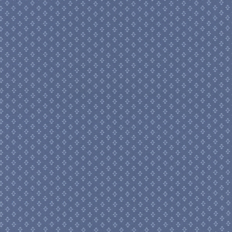 A repeating pattern of small light blue florals on a dark blue background.