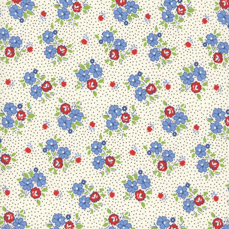 fabric pattern of purple and red ditsy florals on a white dotted background