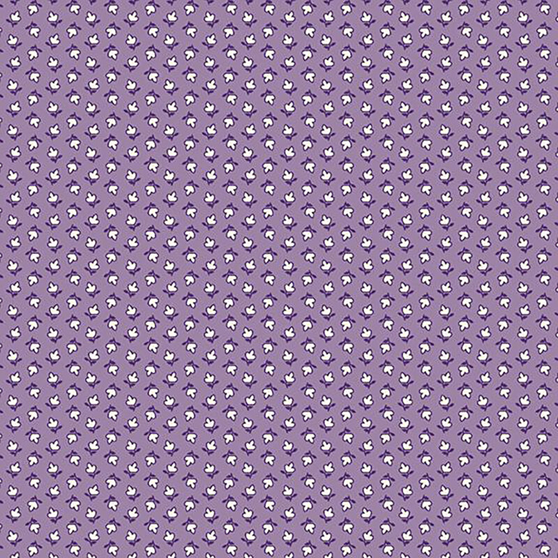 fabric pattern of white floral motifs on a purple background