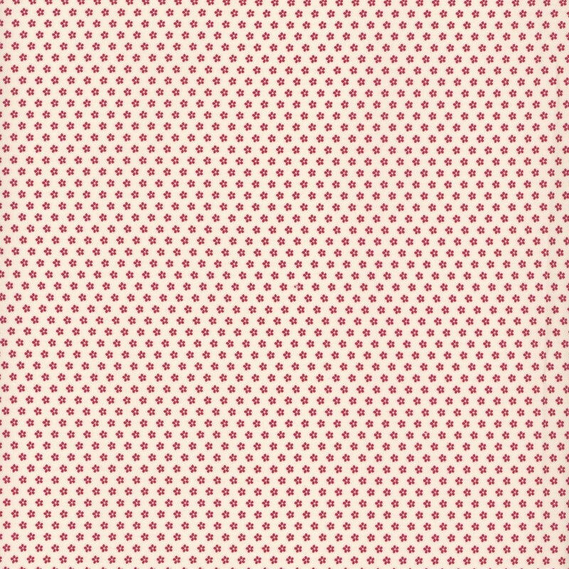 fabric pattern of red floral motifs on a white background