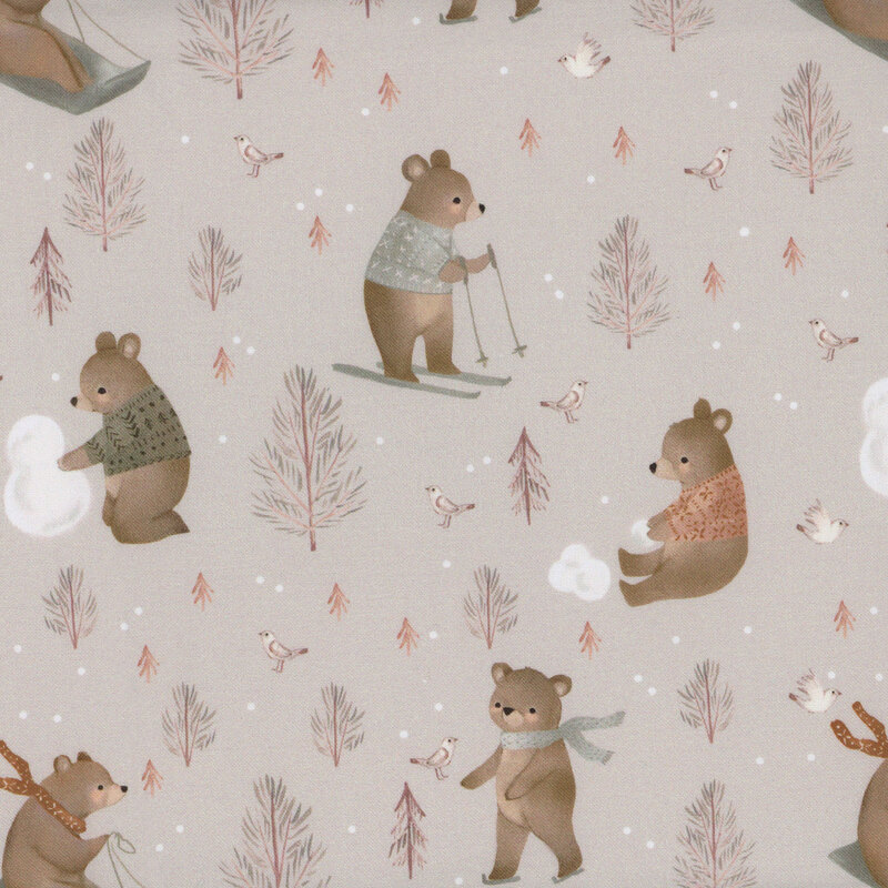 Fabric pattern of playful bears in winter attire, engaging in snowy activities amidst pine trees and birds.