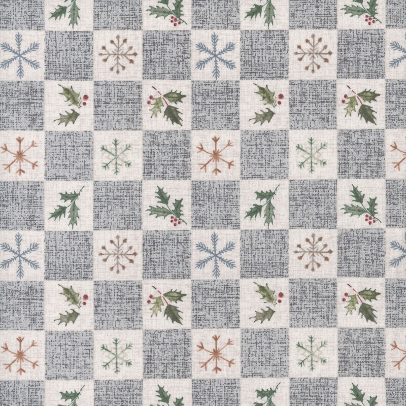 A patterned fabric with textured gray and cream squares featuring snowflakes and holly branches.