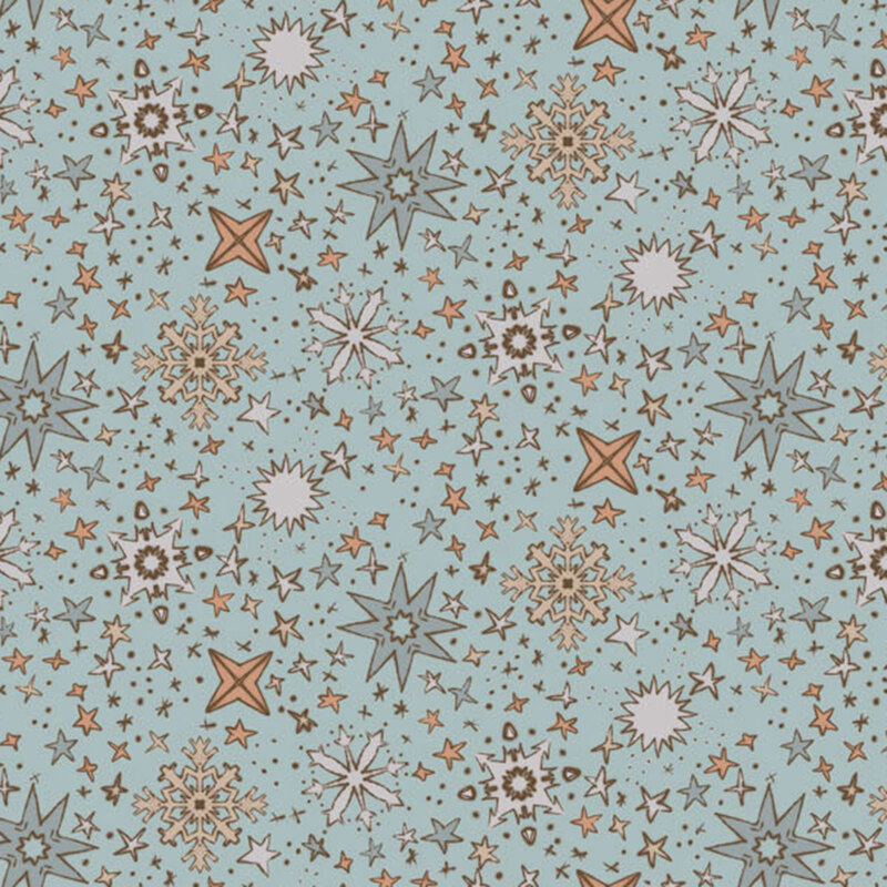 Fabric pattern with stars and snowflakes in various colors on a light blue background.