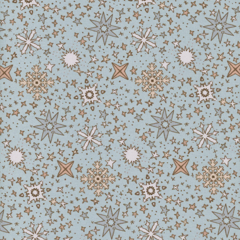 Fabric pattern with stars and snowflakes in various colors on a light blue background.