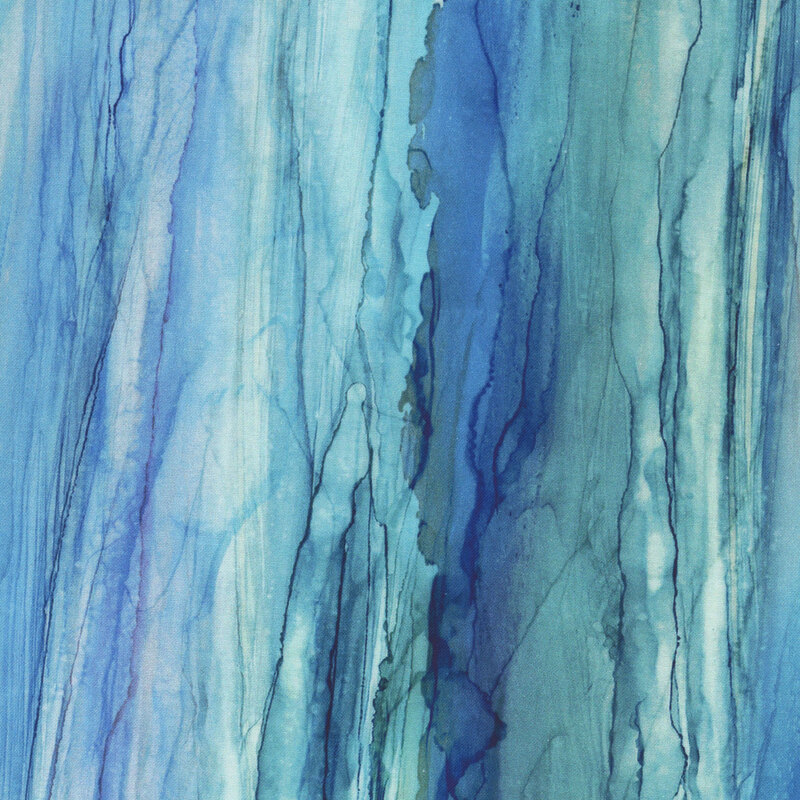 Abstract fabric featuring vertical streaks of varying shades of blue, evoking a sense of depth and fluidity.