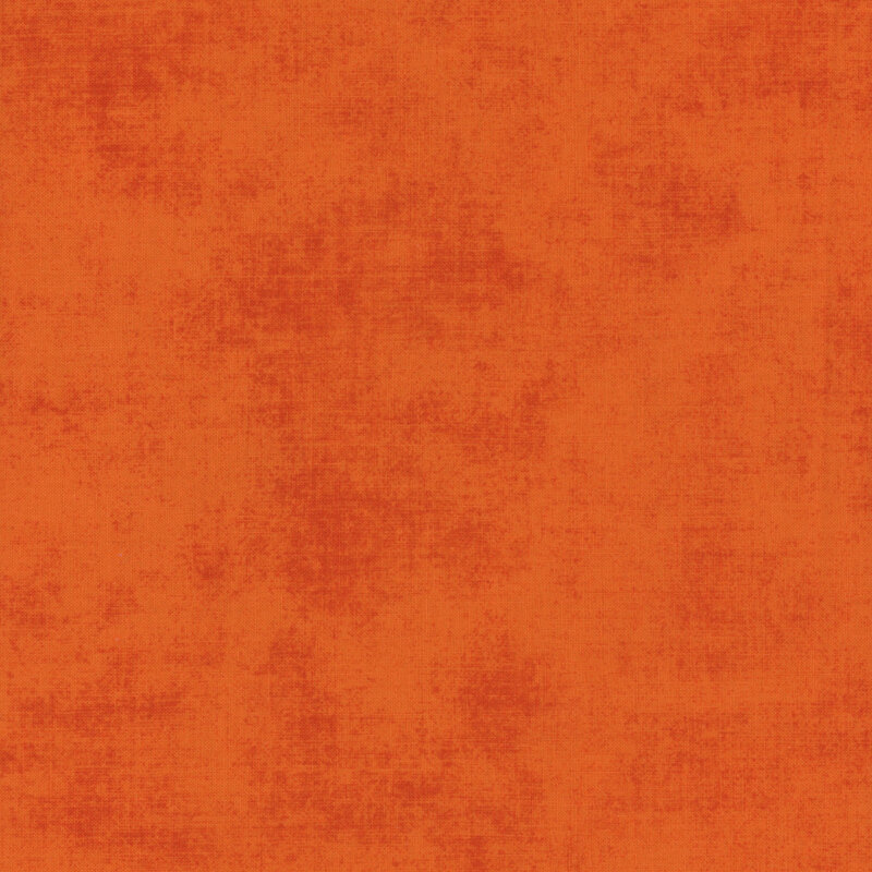 Textured, bright pumpkin orange fabric swatch.