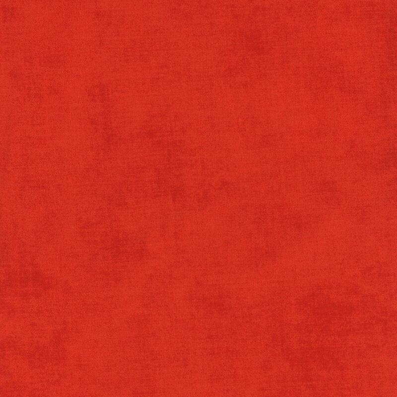 Textured, bright and hot red fabric swatch.