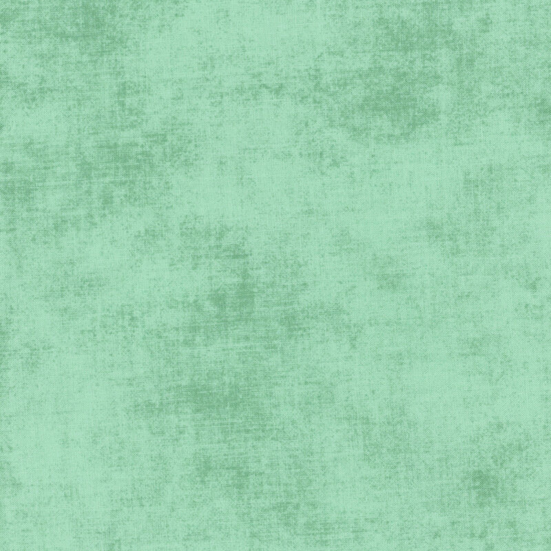 Textured, medium mint green fabric swatch.