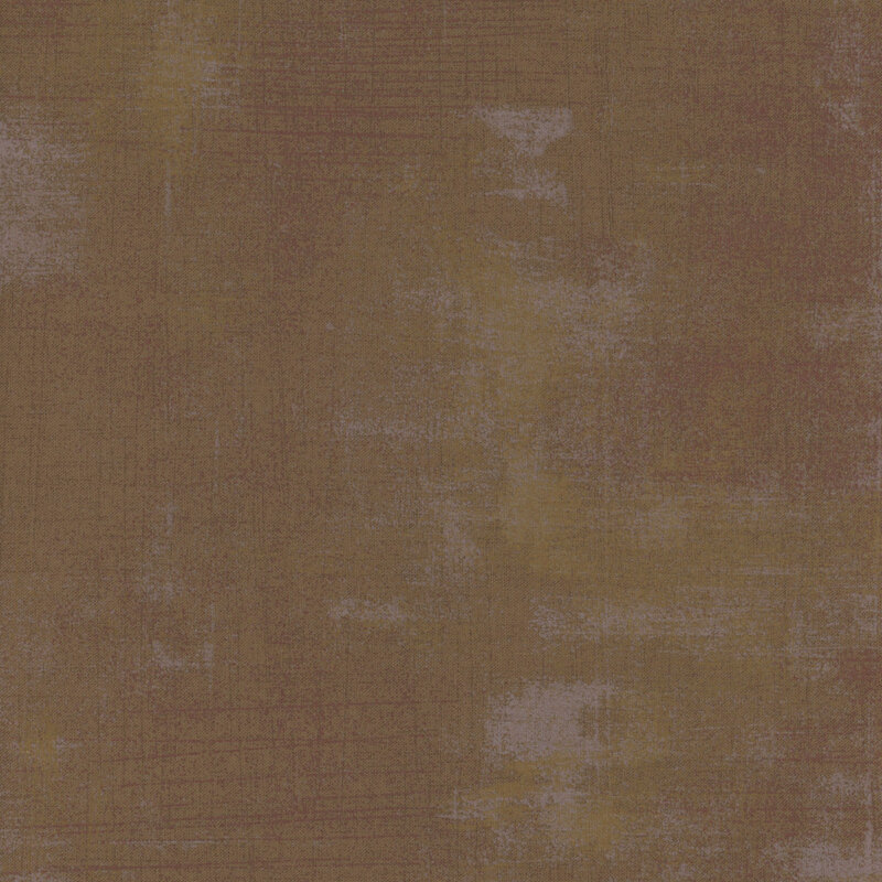 Fabric in neutral brown tones with subtle variations and hints of green.