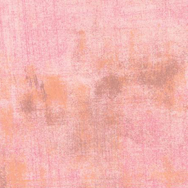 Abstract fabric in soft pink and peach tones, with subtle variations and brushstroke patterns.