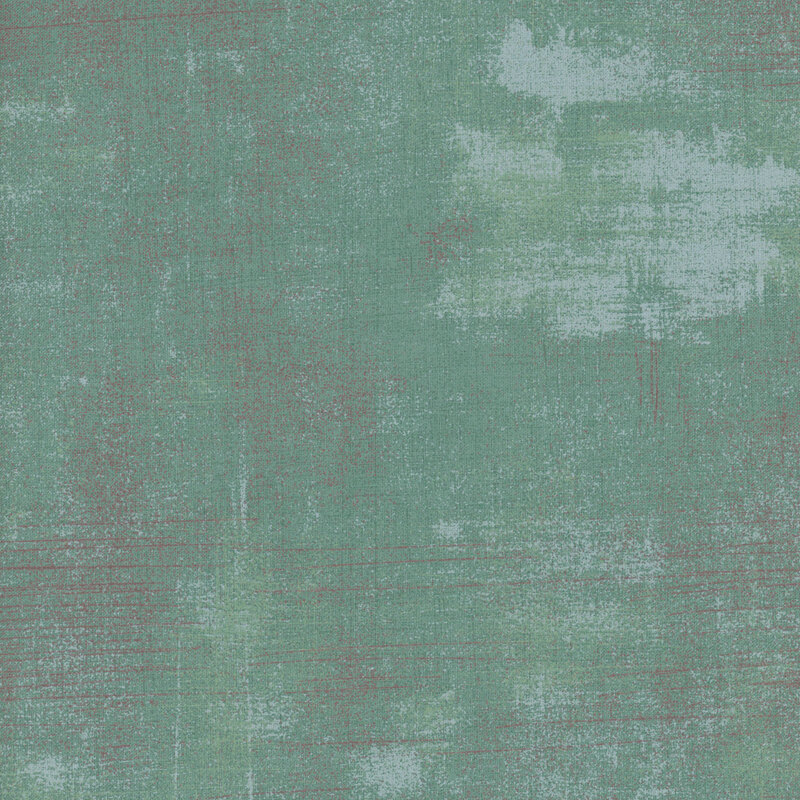 Teal grunge textured fabric swatch.