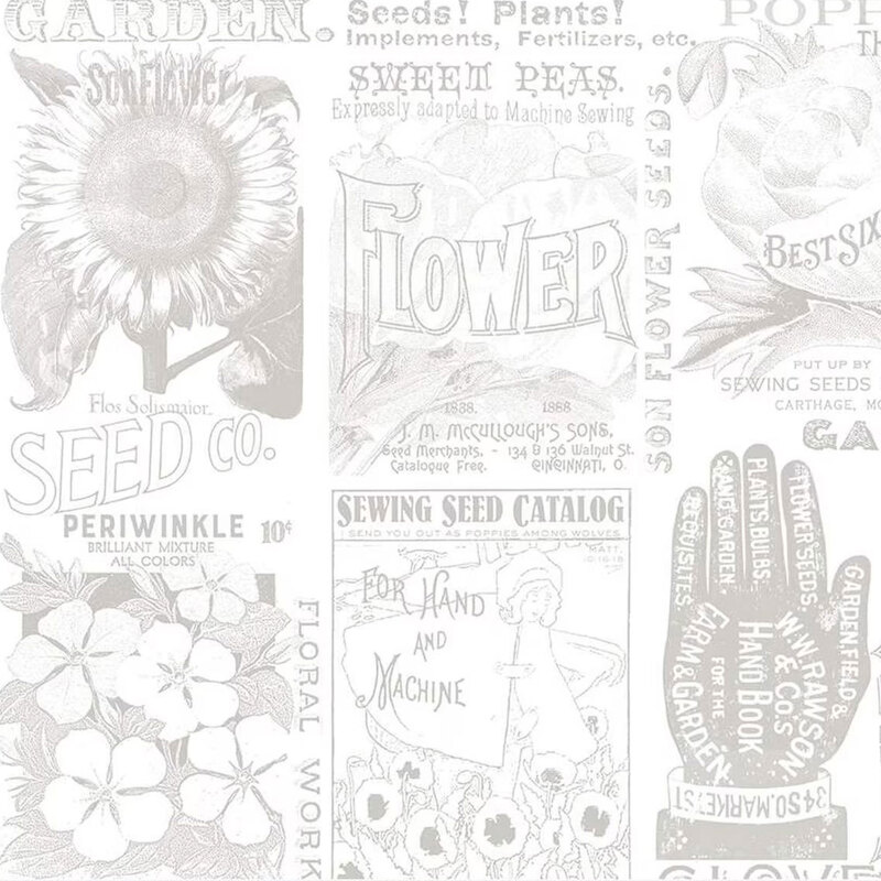 White fabric with grey images of vintage seed advertisements and floral motifs.