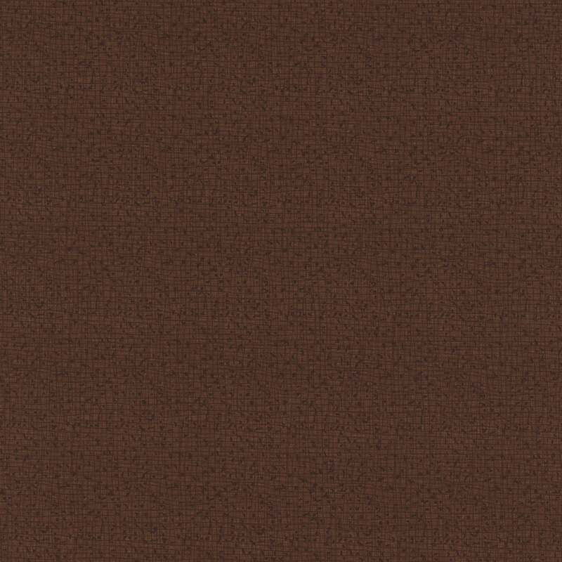 Textured dark brown fabric with a subtle woven pattern.