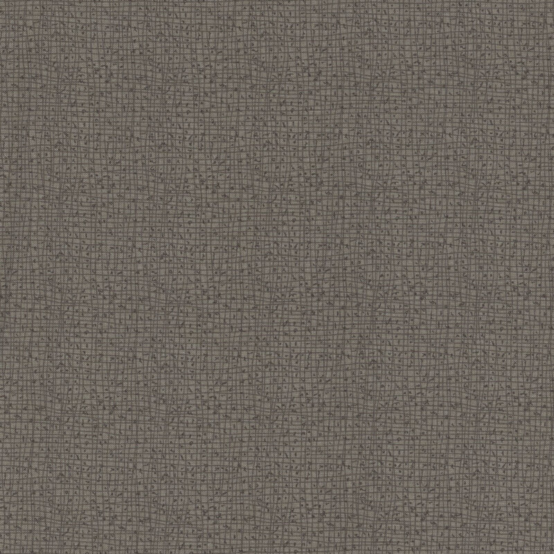 Textured gray fabric with a subtle woven pattern.