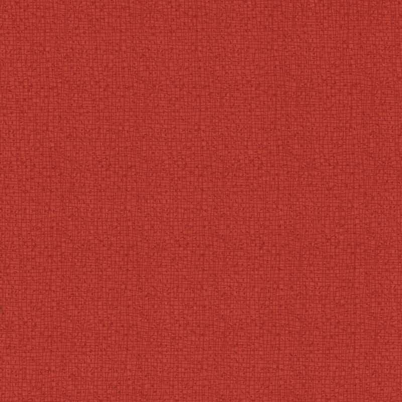 A textured brick red fabric with a subtle woven pattern.