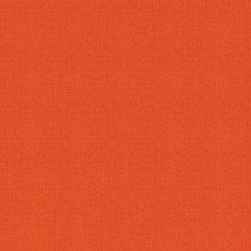 Textured bright orange fabric with a subtle grid pattern.