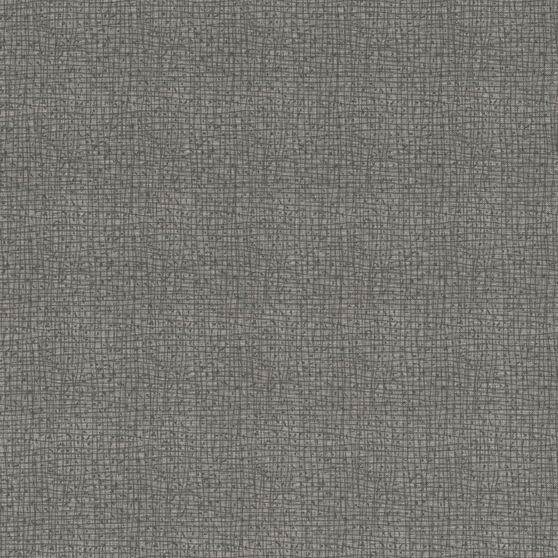 Gray textured fabric with a subtle grid pattern.