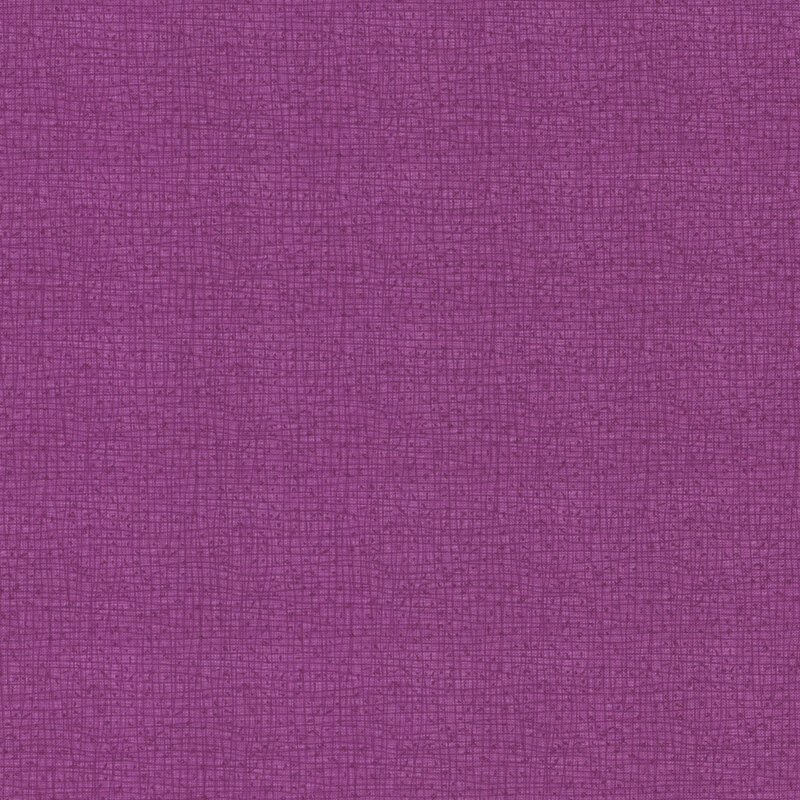 Close-up of textured fabric in a rich, even purple hue.