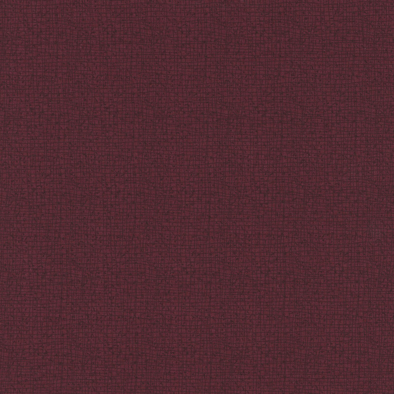 Burgundy textured fabric with a subtle pattern, creating a rich, warm appearance.