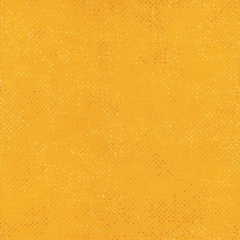 Textured golden yellow fabric with a pattern of small tonal speckles