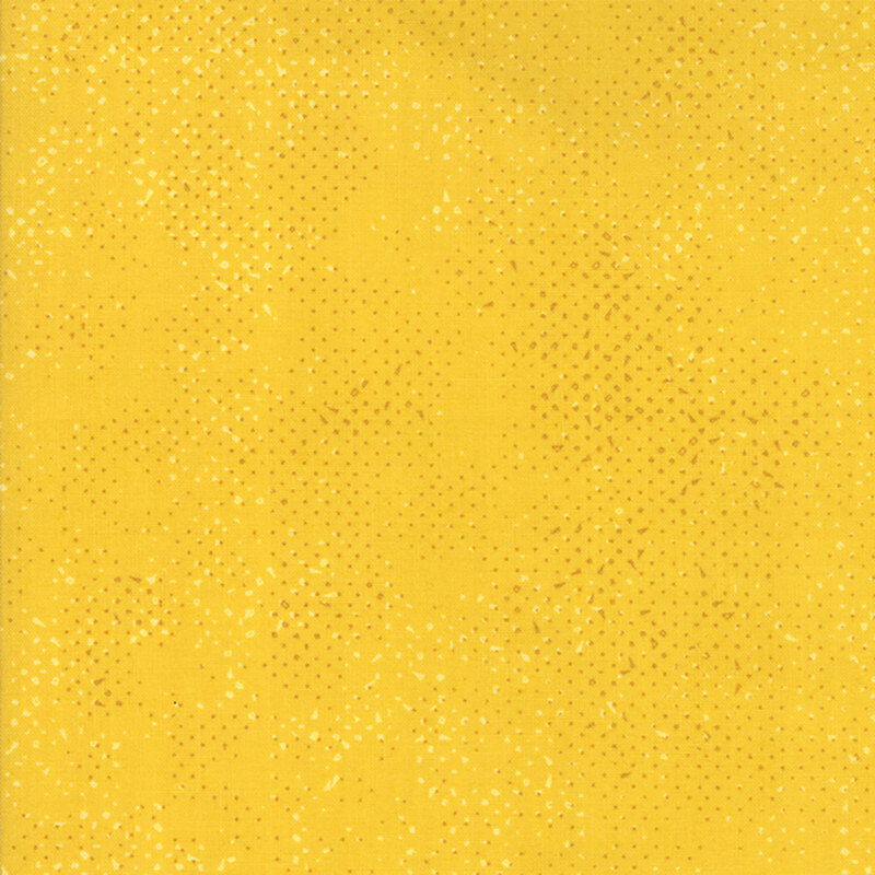 Textured golden yellow fabric with a pattern of small tonal speckles