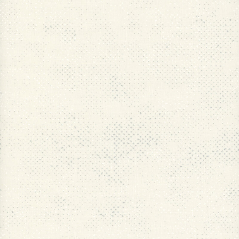 Textured cream fabric with a pattern of small speckles