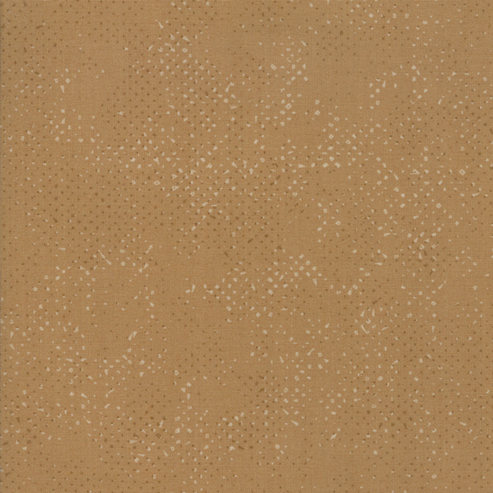 Textured light brown fabric with a pattern of small tonal speckles