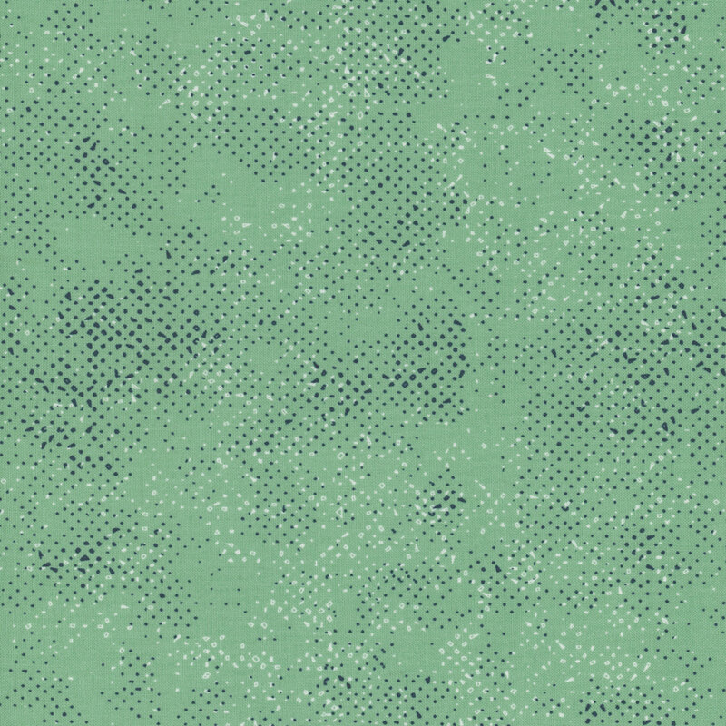 Textured mint green fabric with a pattern of small speckles