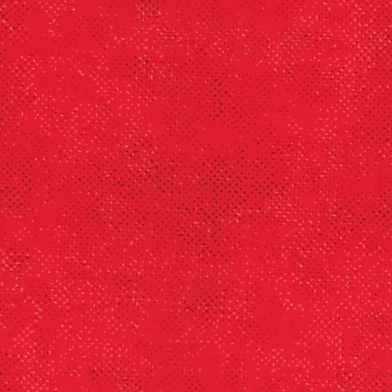 Textured bright red fabric with a pattern of small tonal speckles