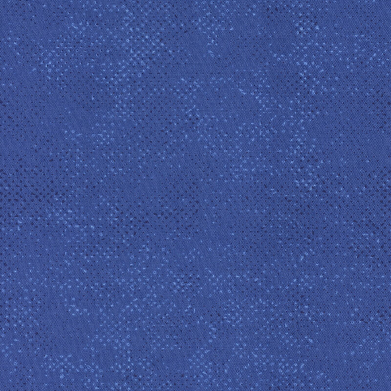 Textured blue fabric with a pattern of small tonal speckles