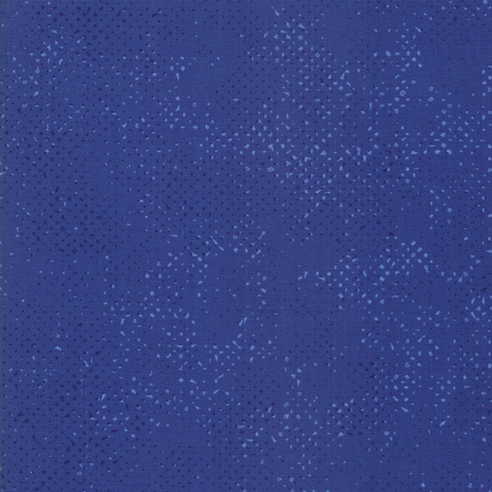 Textured dark blue fabric with a pattern of small tonal speckles