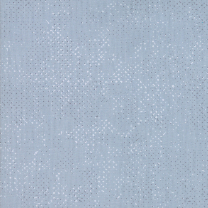 Textured steel blue fabric with a pattern of small tonal speckles